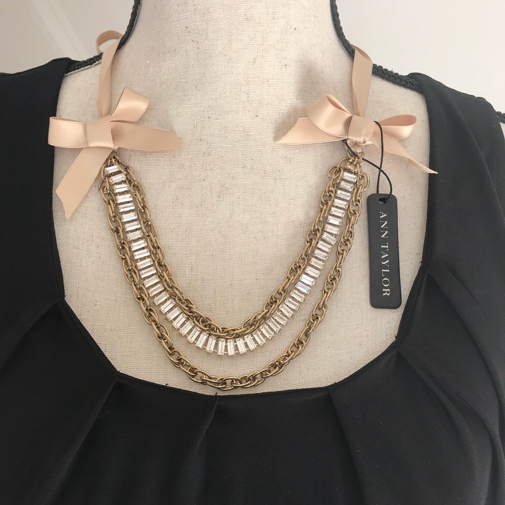 Ann Taylor long adjustable sparkly necklace. NWT. Gold colored.